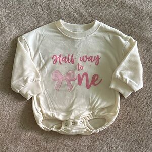Half Way to One Baby Onesie with Pink Bow Design